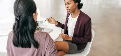 Two woman discussing new strategy